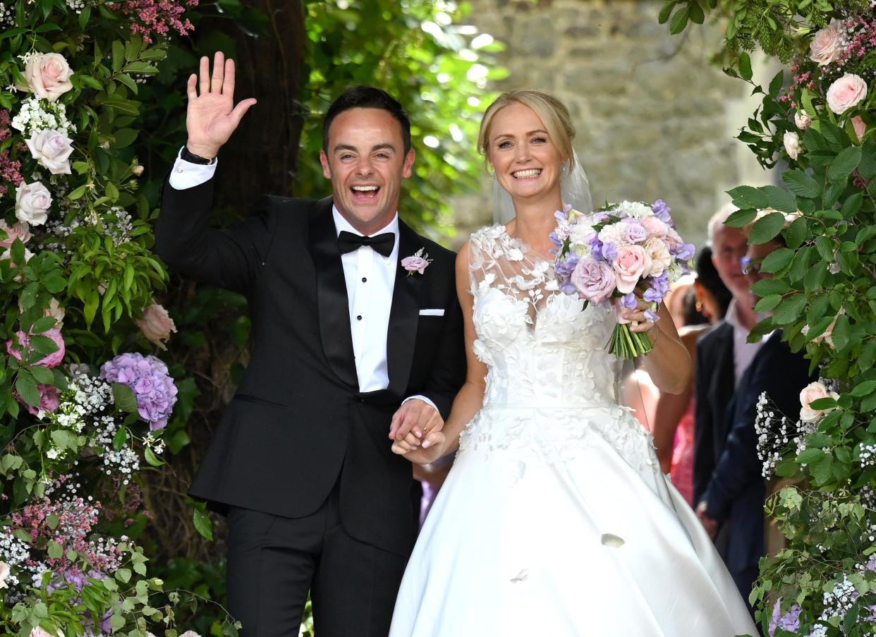 HOOK, HAMPSHIRE - AUGUST 07: (EMBARGOED FOR PUBLICATION IN UK NEWSPAPERS UNTIL 24 HOURS AFTER CREATE DATE AND TIME) Ant McPartlin and Anne-Marie Corbett pose for the photographers after their wedding at St Michaels Church in Heckfield on August 07, 2021 in Hook, Hampshire. (Photo by Karwai Tang/WireImage)