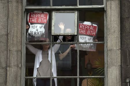 Demonstrators take part in a protest to urge the Irish Government to repeal the 8th amendment to the constitution, which enforces strict limitations to a woman's right to an abortion, in Dublin, Ireland September 24, 2016. REUTERS/Clodagh Kilcoyne