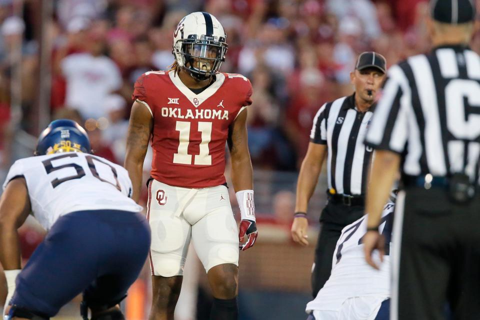 OU's Nik Bonitto (11) lines up during a 16-13 win against West Virginia on Sept. 25 in Norman.