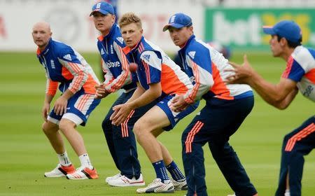 Cricket - England Nets - Lord?s - 14/7/15 England's Joe Root (C) looks on as Alastair Cook prepares to catch a ball during nets Action Images via Reuters / Philip Brown Livepic