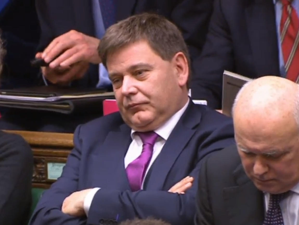 Conservative MP Andrew Bridgen listens as Liberal Democrat MP Layla Moran raises a point of order about his conduct during Prime Minister's Questions in the House of Commons, London.