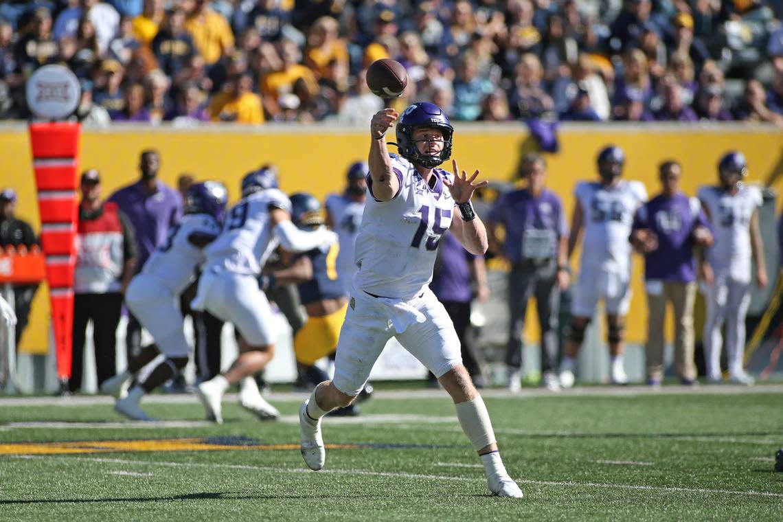 TCU quarterback Max Duggan (15) passes against West Virginia during the first half of an NCAA college football game in Morgantown, W.Va., on Saturday.