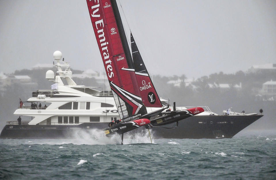<p>In this photo provided by America’s Cup Event Authority, Emirates Team New Zealand and Great Britain’s Land Rover BAR (not shown) compete in an America’s Cup challenger semifinal on the Great Sound in Bermuda on Tuesday, June 6, 2017. (Gilles Martin-Raget/ACEA via AP) </p>