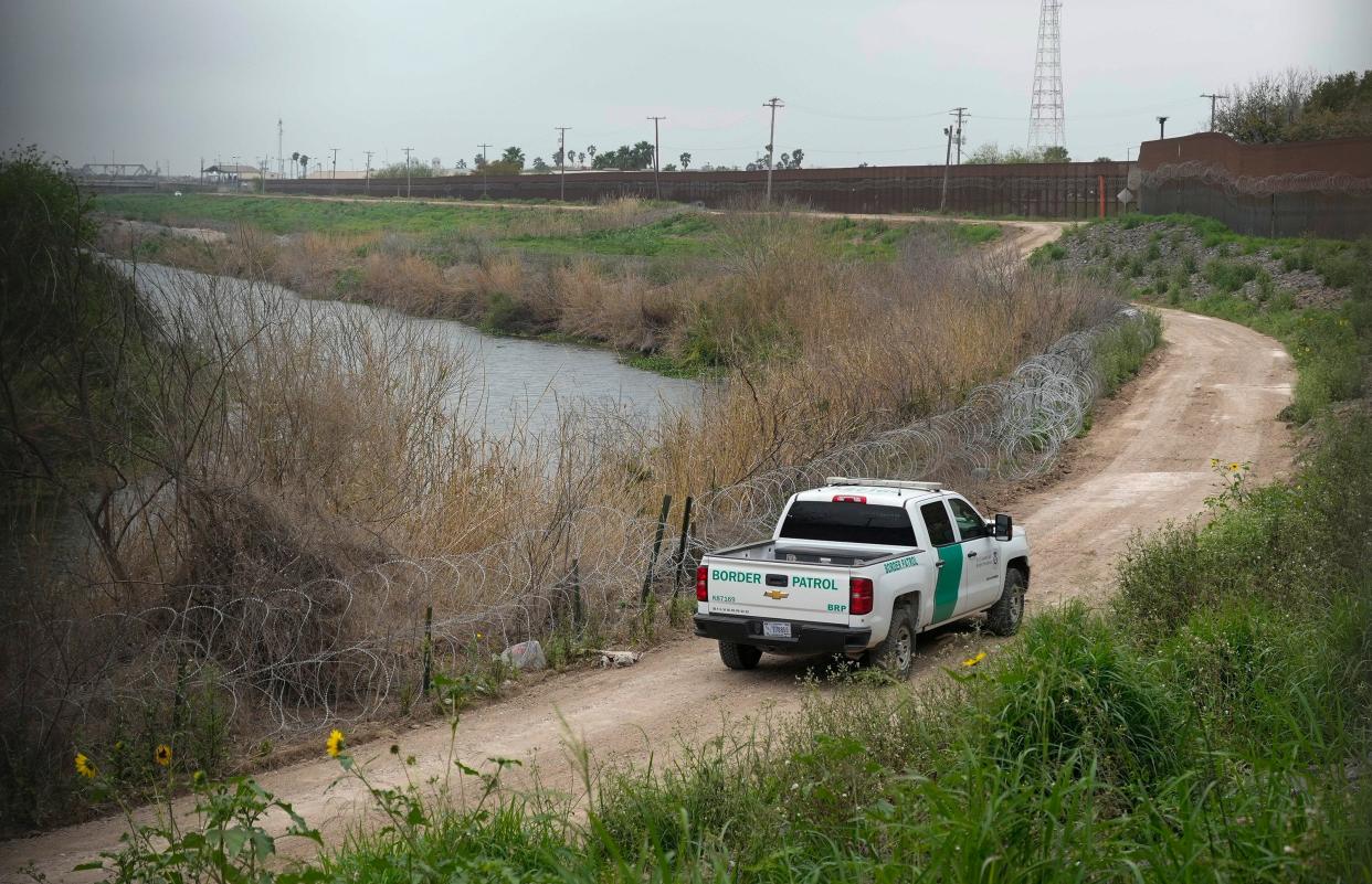 A Border Patrol officer patrols the banks of the Rio Grande in Brownsville, Wednesday February 28. (Credit: Jay Janner/American-Statesman)