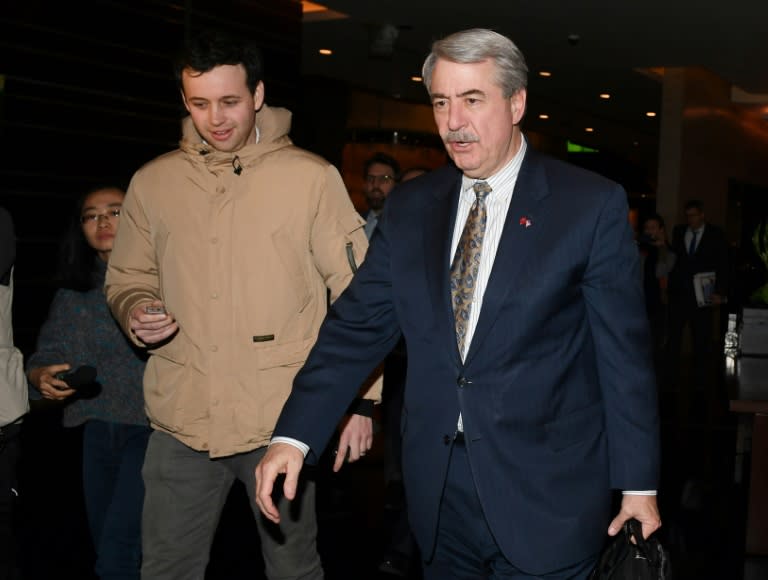 US Under Secretary for Trade and Foreign Agricultural Affairs Ted McKinney (R) after a second day of trade talks in China