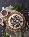 <p>Frothy, creamy, chocolatey, and covered in little marshmallows, this pie is best served alongside a cup of the drink that inspired it. </p><p><strong><a href="https://www.countryliving.com/food-drinks/a41769532/hot-chocolate-ice-box-pie-recipe/" rel="nofollow noopener" target="_blank" data-ylk="slk:Get the recipe for Hot Chocolate Ice Box Pie;elm:context_link;itc:0;sec:content-canvas" class="link ">Get the recipe for Hot Chocolate Ice Box Pie</a>.</strong></p>