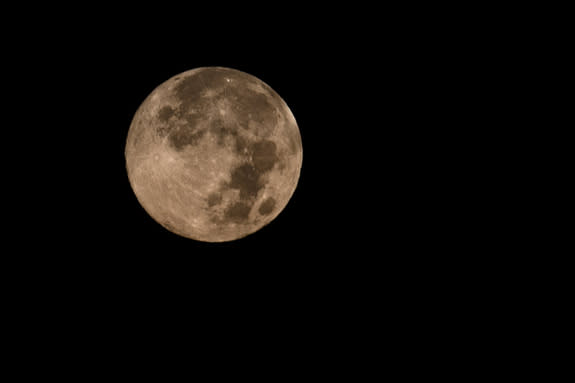 Night sky watcher Tomsajinsa sent in this photo of the blue moon taken in NYC, August 31, 2012.