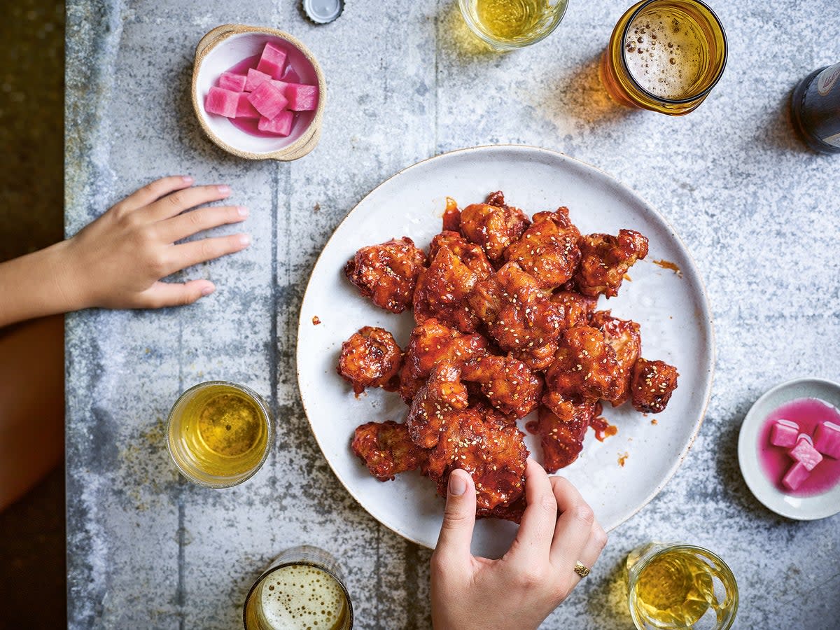 There’s a reason Korea is famous for fried chicken – this dish is crispy and moreish (PA)