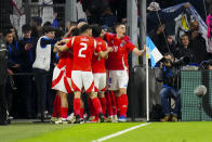 Chile's Marcelino Nunez is congratulated after scoring his side's opening goal during an international friendly soccer match between France and Chile at the Orange Velodrome stadium in Marseille, southern France, Tuesday, March 26, 2024. (AP Photo/Daniel Cole)