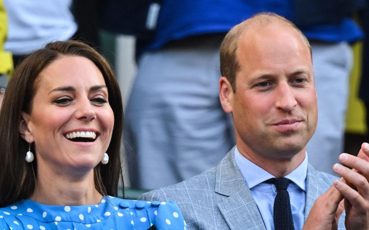The Duke and Duchess of Cambridge react as Cameron Norrie beats Belgium's David Goffin in the quarter finals on Court 1 - AFP