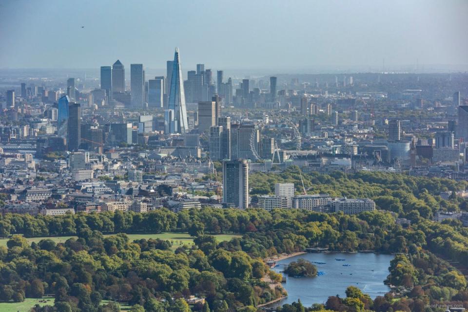 View over the Serpentine, Hyde Park to Mayfair and beyond the London Eye, Shard and Canary Wharf (Jason Hawkes)