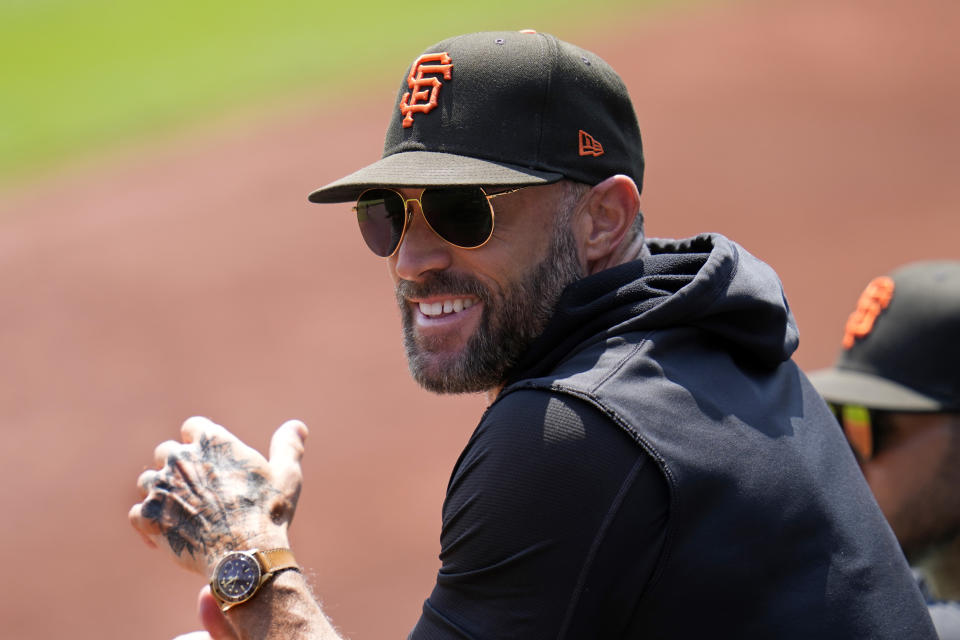 San Francisco Giants manager Gabe Kapler stands in the dugout during the first inning of a baseball game against the Pittsburgh Pirates in Pittsburgh, Sunday, July 16, 2023. (AP Photo/Gene J. Puskar)