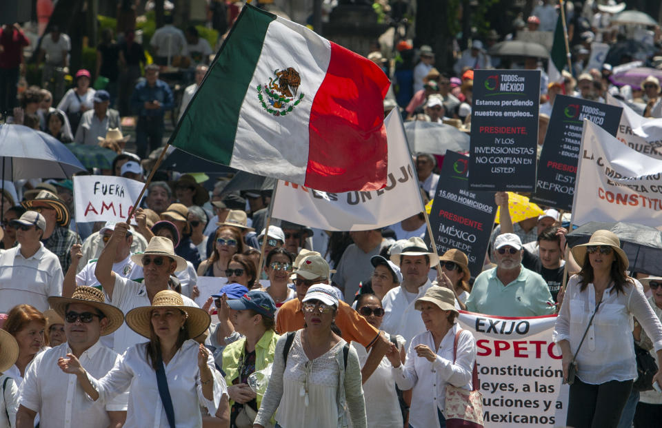 People take part in the so-called "We Revive Mexico" march against Mexican President Andres Manuel Lopez Obrador's policies in Mexico City, on June 30, 2019. (Photo by ANTONIO NAVA / AFP)        (Photo credit should read ANTONIO NAVA/AFP/Getty Images)