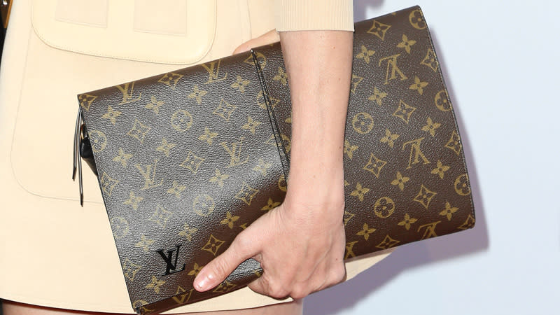 A Louis Vuitton clutch.  Photo:Getty