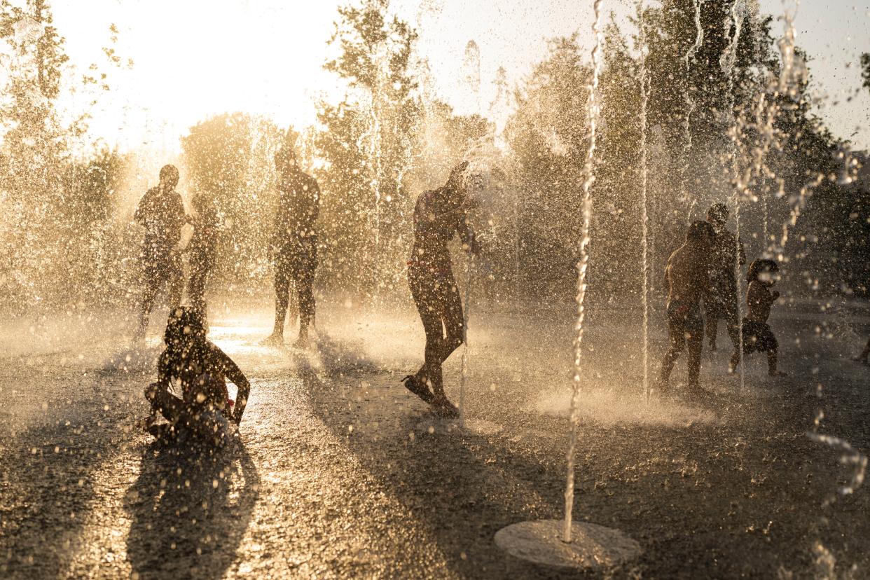 Children play in a fountain in Athens during hot weather over the weekend (Copyright 2023 The Associated Press. All rights reserved.)