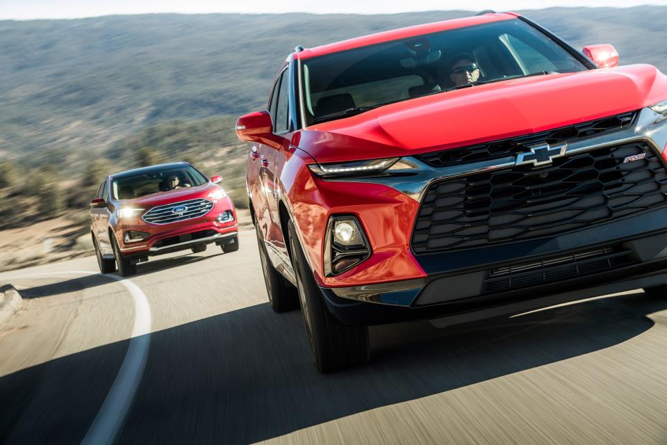 <p>At long last, the <a rel="nofollow noopener" href="https://www.caranddriver.com/chevrolet/blazer" target="_blank" data-ylk="slk:Chevrolet Blazer;elm:context_link;itc:0;sec:content-canvas" class="link ">Chevrolet Blazer</a> nameplate is back! Only one hitch: That name is plastered down the flanks of a mainstream two-row, mid-size crossover, rather than on an off-road-ready, truck-based SUV where many fans believe it belongs. This new-school-versus-old-school issue playing out in real time among Chevy fans everywhere overshadows the fact that the bow-tie brand hasn't played in this popular SUV segment in a while.</p><p>Sharing its platform with the Cadillac XT5 and the GMC Acadia, the new-for-2019 Blazer brings its Camaro-inspired looks to a segment anchored by seasoned veterans, namely the Chevy's own crosstown rival, <a rel="nofollow noopener" href="https://www.caranddriver.com/ford/edge" target="_blank" data-ylk="slk:the Ford Edge;elm:context_link;itc:0;sec:content-canvas" class="link ">the Ford Edge</a>-now in its second generation and last updated for 2015-making it a proven measuring stick for the contemporary Blazer's worth.</p>