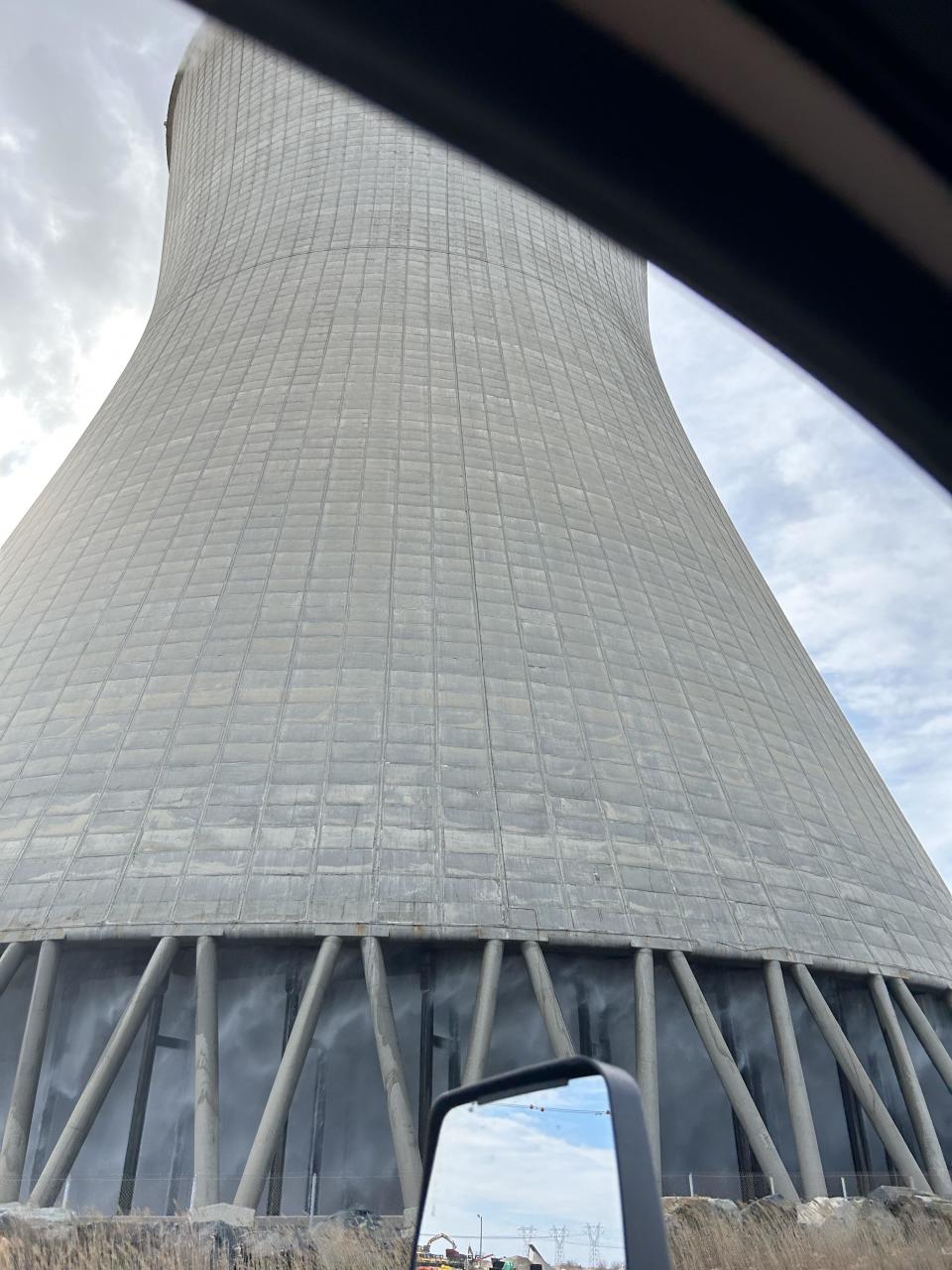 The base of a cooling tower with glass windows