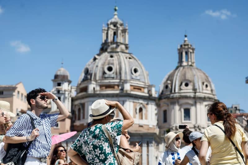 Pilgrims and tourists are confronted "shameless extortions," according to Elizabeth Lev, an expert on Christian art who leads tours of Rome's Catholic shrines. Cecilia Fabiano/LaPresse via ZUMA Press/dpa