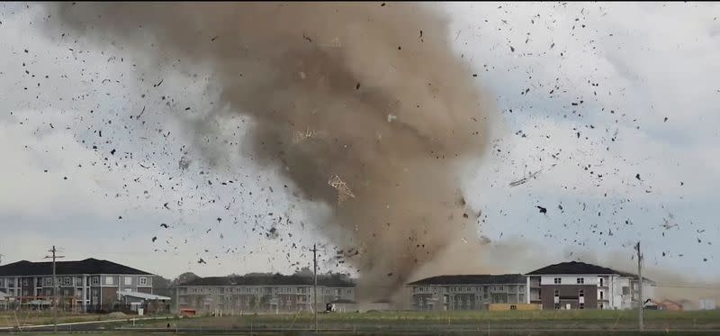 Debris is lifted into the air by a possible tornado near Greenwood, Indiana