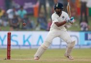 Cricket - Sri Lanka v India - First Test Match - Galle, Sri Lanka - July 26, 2017 - India's cricketer Cheteshwar Pujara plays a shot. REUTERS/Dinuka Liyanawatte