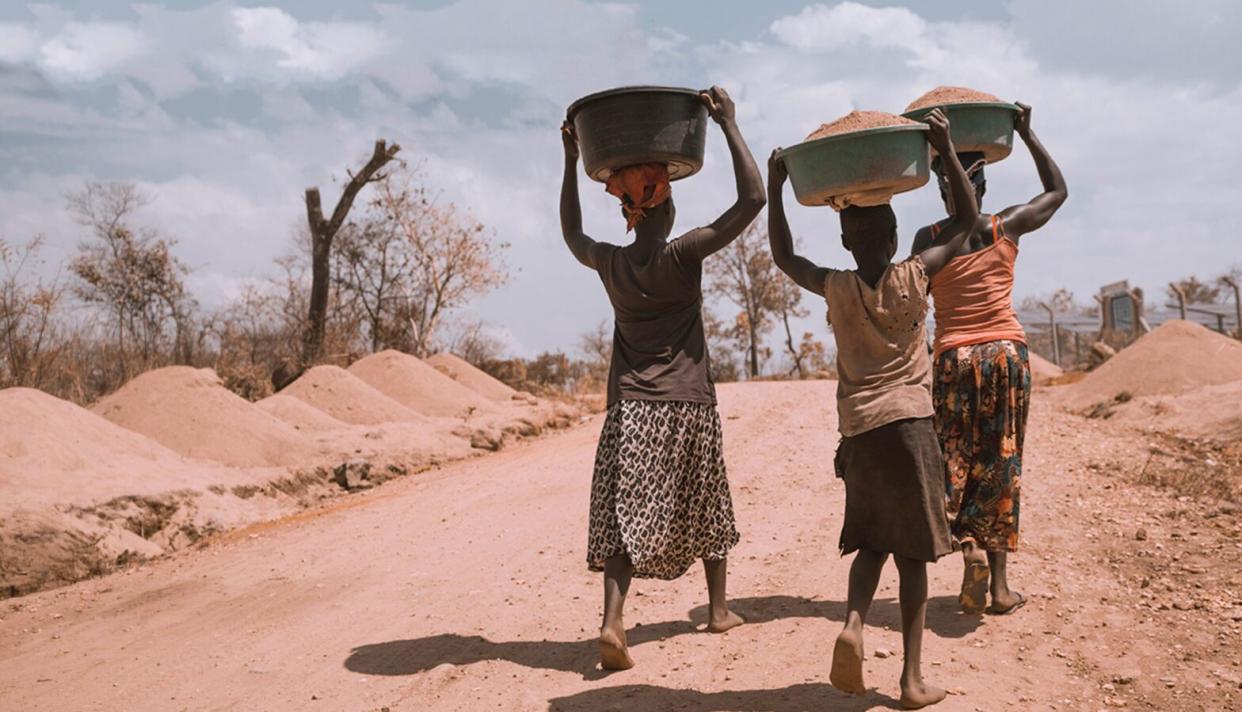 people walking with baskets