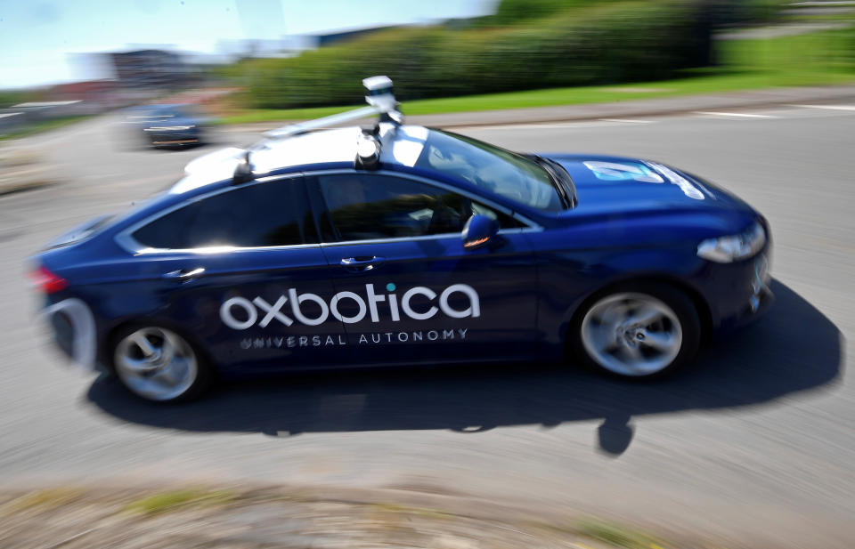 A passenger vehicle is seen traveling autonomously using Oxbotica software during a trial on public roads in Oxford, Britain, June 27, 2019. Picture taken June 27, 2019. REUTERS/Toby Melville