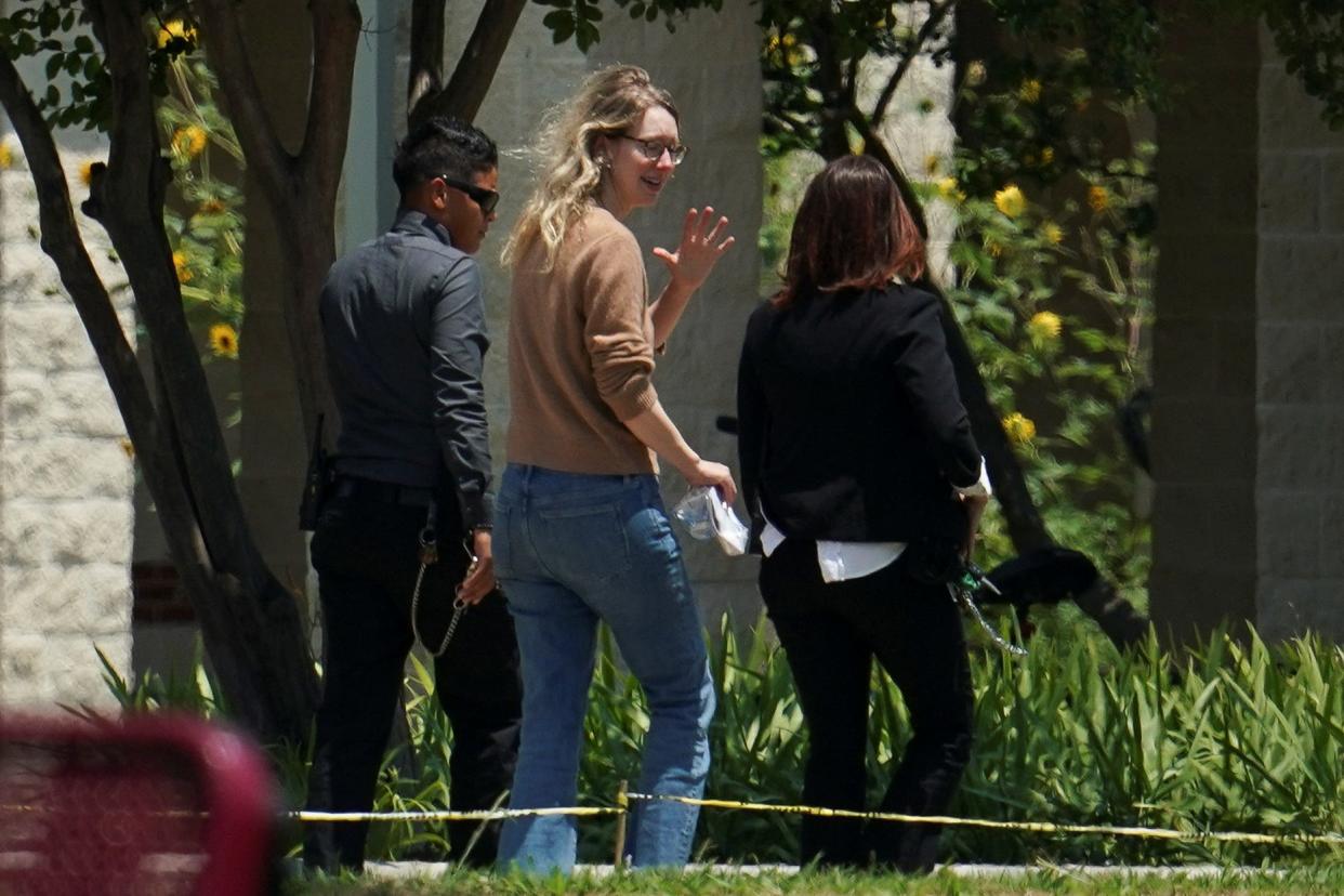 Theranos founder Elizabeth Holmes arrives to begin serving her prison sentence for defrauding investors in the failed blood-testing startup, at the Federal Prison Camp in Bryan, Texas, U.S. May 30, 2023.