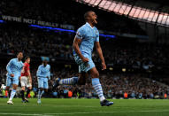 MANCHESTER, ENGLAND - APRIL 30: Vincent Kompany of Manchester City celebrates scoring the opening goal during the Barclays Premier League match between Manchester City and Manchester United at the Etihad Stadium on April 30, 2012 in Manchester, England. (Photo by Michael Regan/Getty Images)