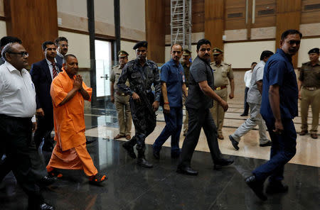 FILE PHOTO: Yogi Adityanath, newly appointed Chief Minister of India's most populous state of Uttar Pradesh, arrives to attend a meeting with government officials at Lok Bhavan in Lucknow, India March 20, 2017. REUTERS/Pawan Kumar/File Photo