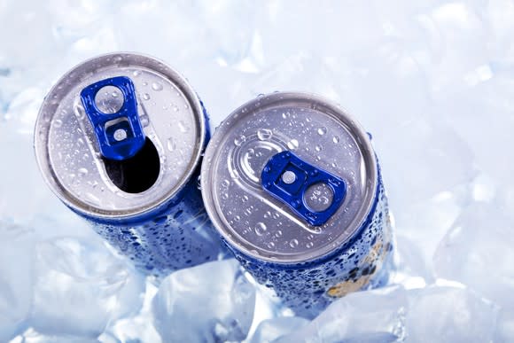 Top view of two cans of energy drinks in ice