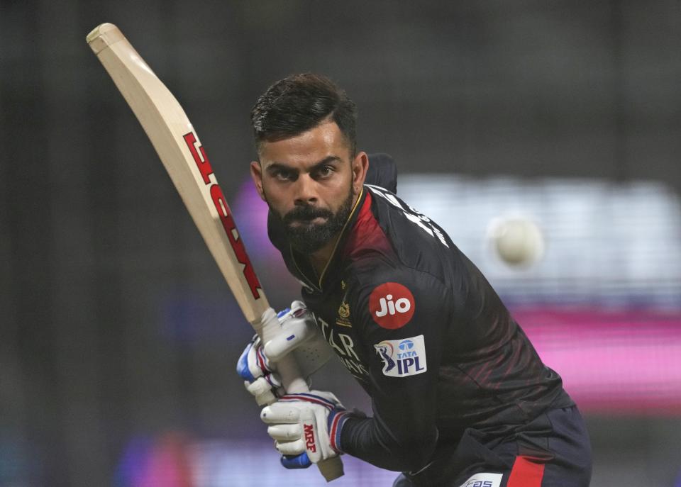 Royal Challenger Bangalore's Virat Kohli practice bats ahead of the Indian Premier League (IPL) cricket match between Royal Challengers Bangalore and Kolkata Knight Riders in Kolkata, India, Thursday, April 6, 2023. (AP Photo/Bikas Das)