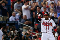 Jose Constanza #13 of the Atlanta Braves reacts from thrid base after he hits a triple in the seventh inning against the St. Louis Cardinals during the National League Wild Card playoff game at Turner Field on October 5, 2012 in Atlanta, Georgia. (Photo by Kevin C. Cox/Getty Images)