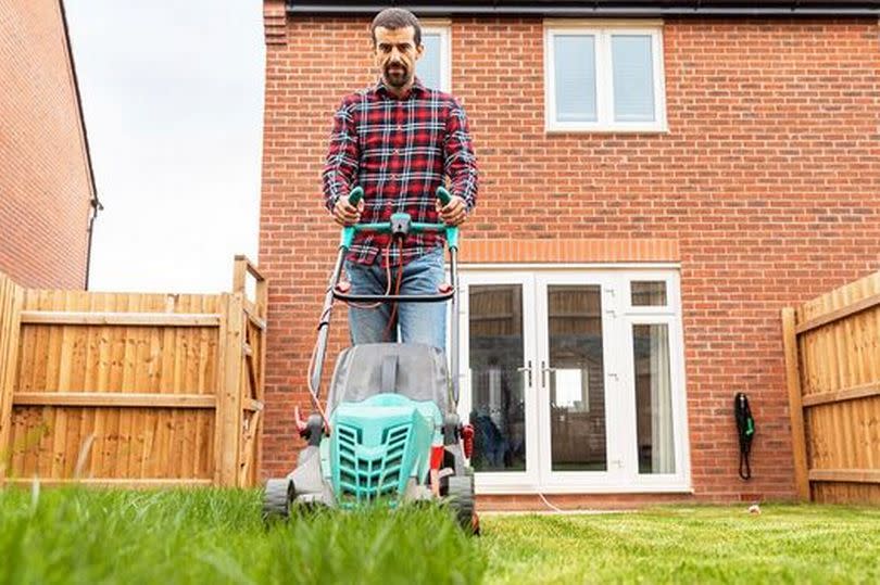 Man mowing lawn