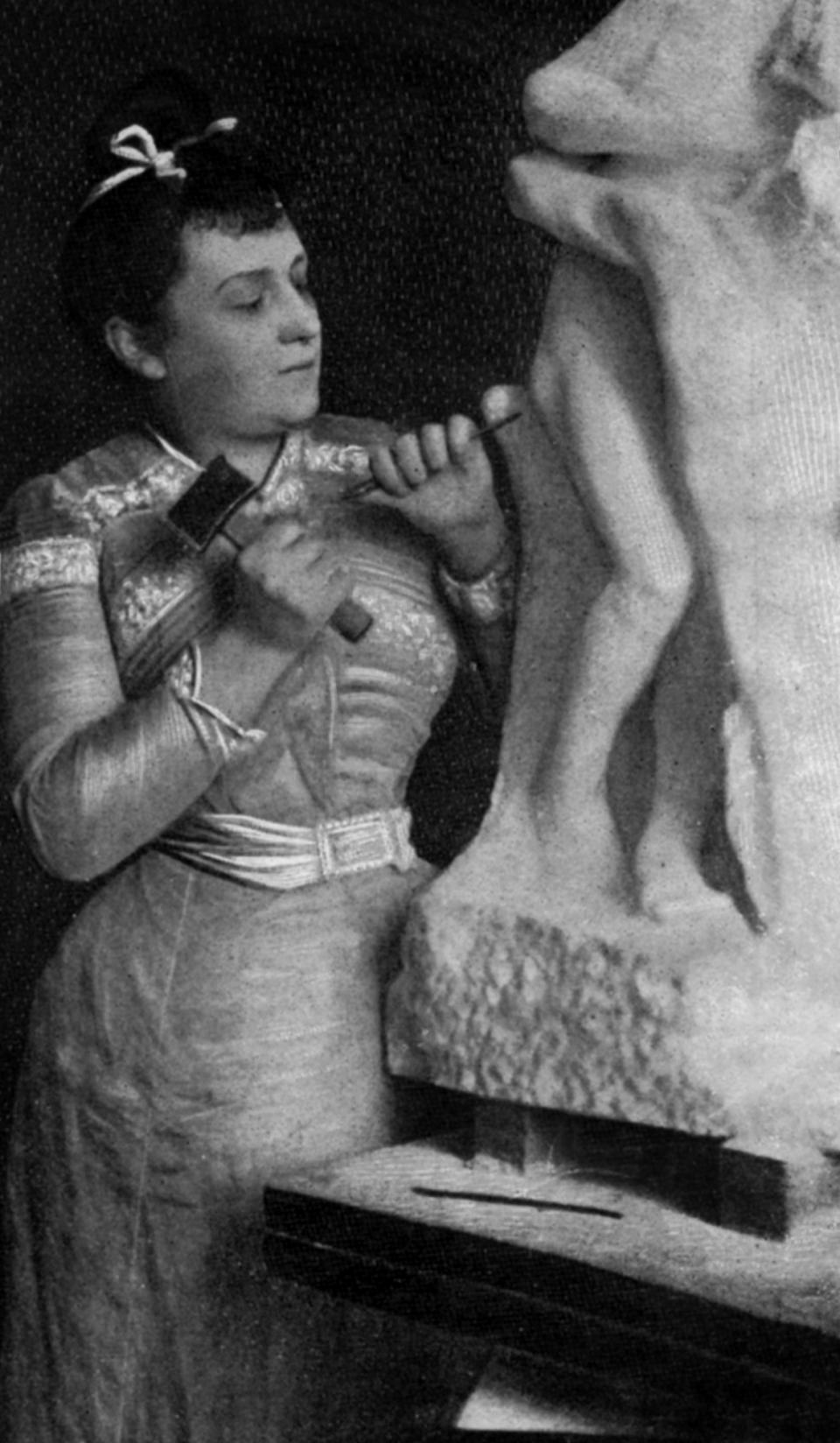 Sculptor Camille Claudel at work on Vertumnus and Pomona marble group about 1903