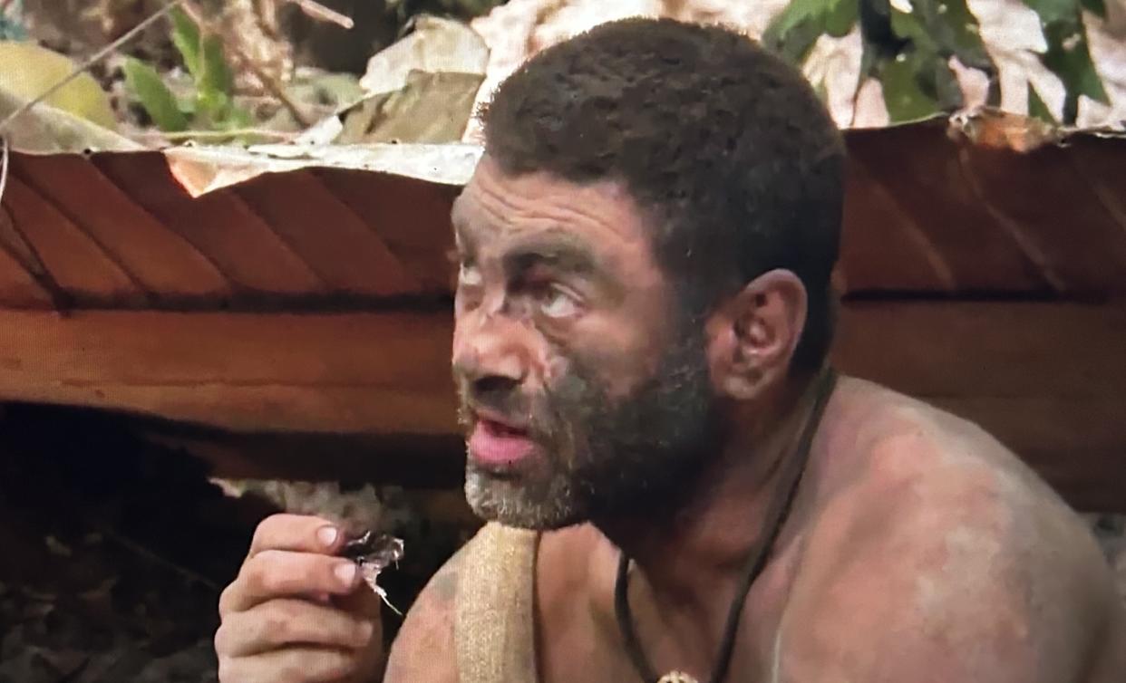 Bulent enjoys smoked pig on Naked and Afraid: Castaways. (Discovery)