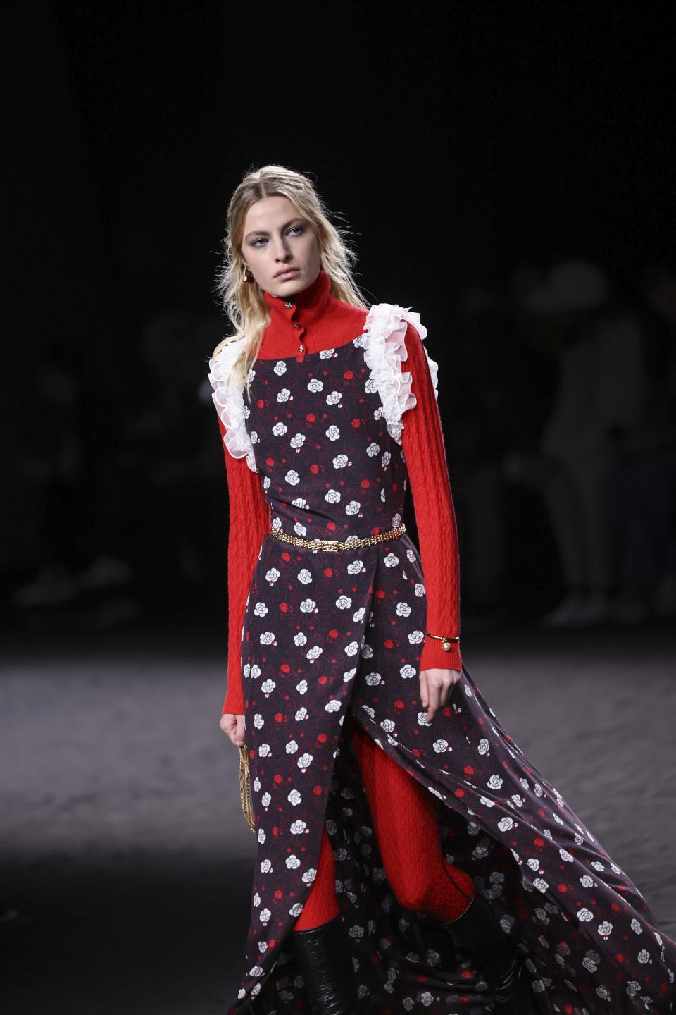 A model wears a creation as part of the Chanel Fall/Winter 2023-2024 ready-to-wear collection presented Tuesday, March 7, 2023 in Paris. (Vianney Le Caer/Invision/AP)