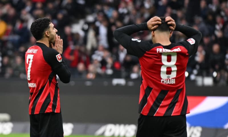 Eintracht Frankfurt's Omar Marmoush (L) and Fares Chaibi react after a missed chance during the German Bundesliga soccer match between Eintracht Frankfurt and VfL Bochum at Deutsche Bank Park. Arne Dedert/dpa