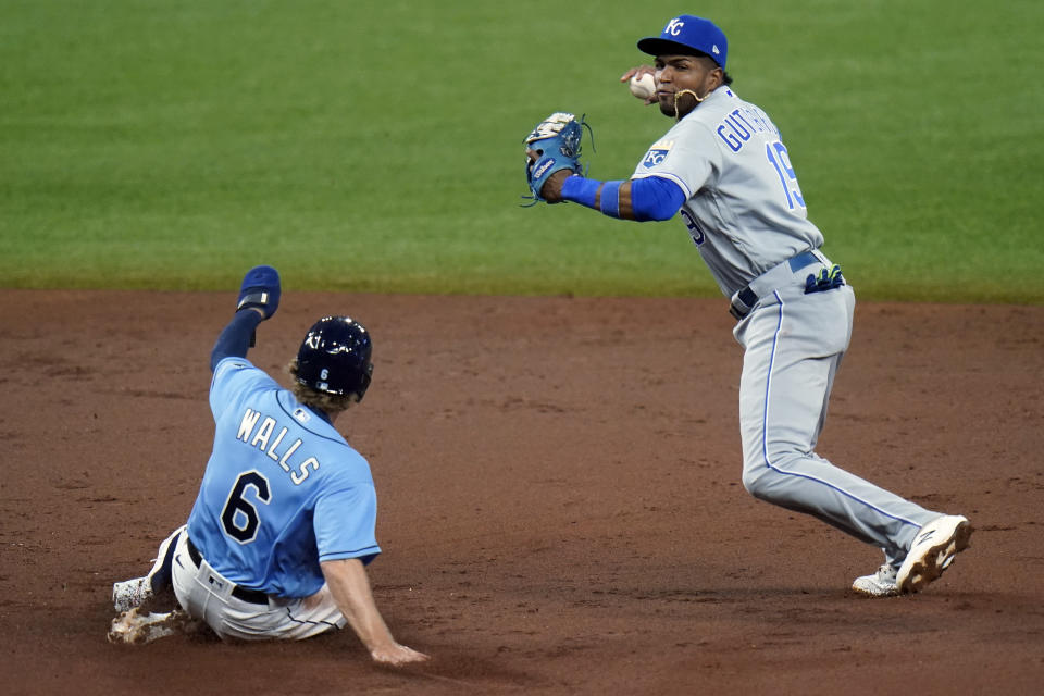 Kansas City Royals third baseman Kelvin Gutierrez (19) forces Tampa Bay Rays' Taylor Walls at second base on a fielder's choice by Francisco Mejia during the second inning of a baseball game Tuesday, May 25, 2021, in St. Petersburg, Fla. (AP Photo/Chris O'Meara)
