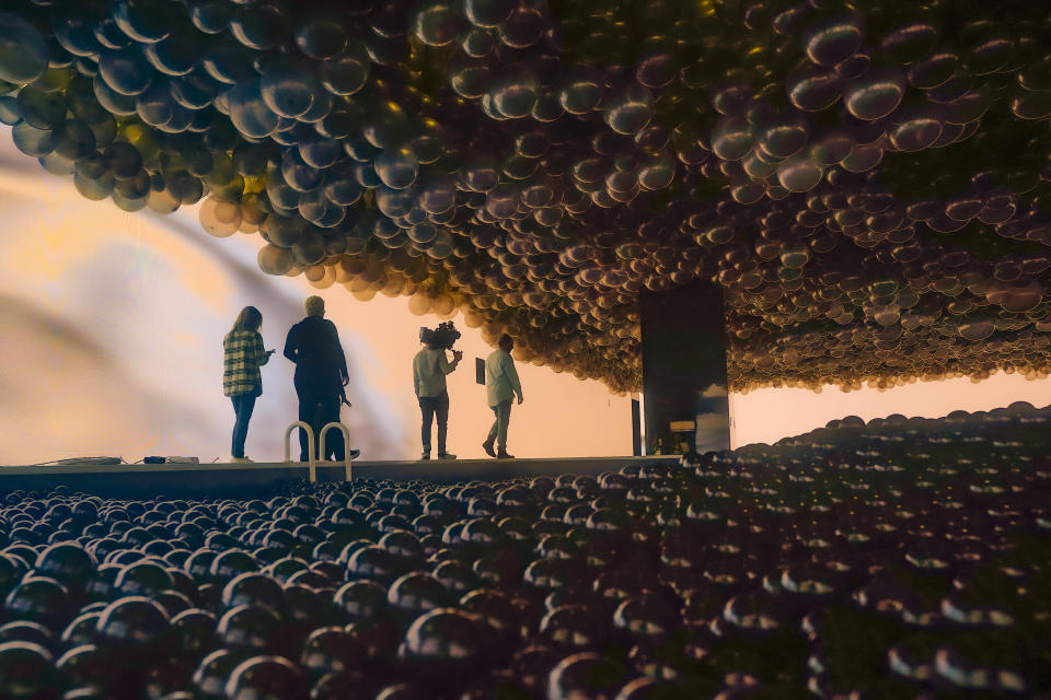 An immersive installation ball pit called "Hyperstellar" by Hyperstudio, is installed as part of the Balloon Museum's U.S. exhibition "Let's Fly," at the museum's Manhattan's Pier 36 site, Tuesday, Oct. 24, 2023, in New York. The exhibition runs from Oct. 27, through Jan. 14. (AP Photo/Bebeto Matthews)