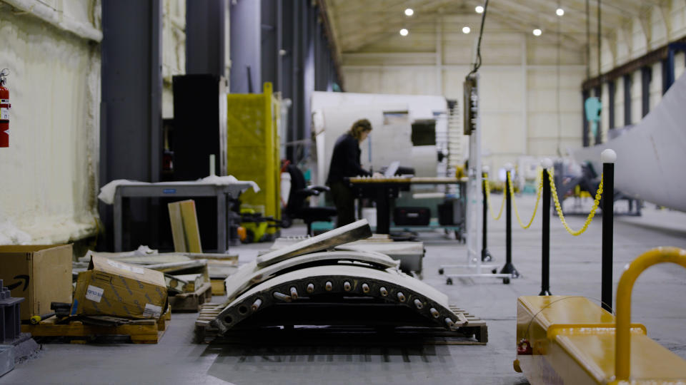 A worker at the Gulf Wind Technology factory at the Avondale Shipyard in Avondale, Louisiana, builds wind turbine rotors.