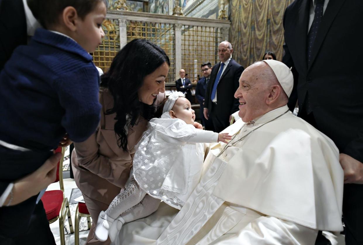 Pope Francis baptizes 16 infants in the Sistine Chapel on Jan. 7, 2024, in Vatican City. <a href="https://www.gettyimages.com/detail/news-photo/pope-francis-baptises-16-infants-in-the-sistine-chapel-on-news-photo/1914446578?adppopup=true" rel="nofollow noopener" target="_blank" data-ylk="slk:Vatican Media via Vatican Pool/Getty Images;elm:context_link;itc:0;sec:content-canvas" class="link ">Vatican Media via Vatican Pool/Getty Images</a>