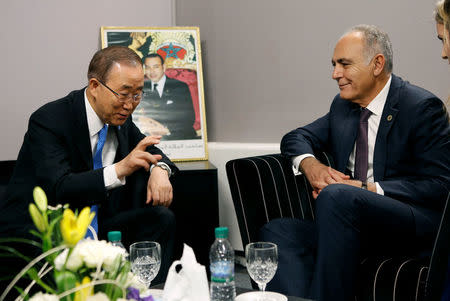 United Nations Secretary-General Ban Ki-moon speaks with Moroccan Foreign Minister and President of COP22 Salaheddine Mezouar at the UN World Climate Change Conference 2016 (COP22) in Marrakech, Morocco, November 17, 2016. REUTERS/Youssef Boudlal