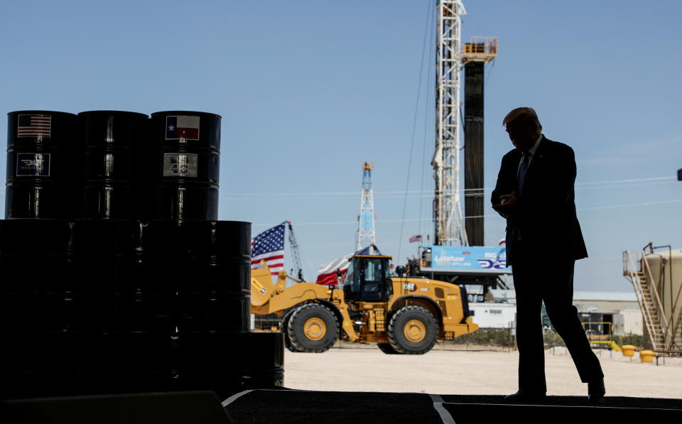 President Donald Trump arrives to deliver a speech during a tour of an oil rig in Midland, Texas, in July. a (Photo: Carlos Barria/Reuters)