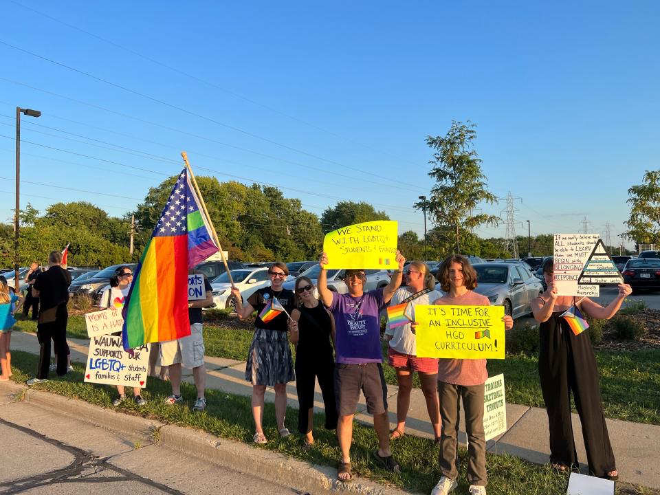 Minutes before the Wauwatosa School Board met Aug. 22 to vote on a revamped human growth and development plan, community members gathered to show support for both the curriculum and for LGBTQ+ students in the district.