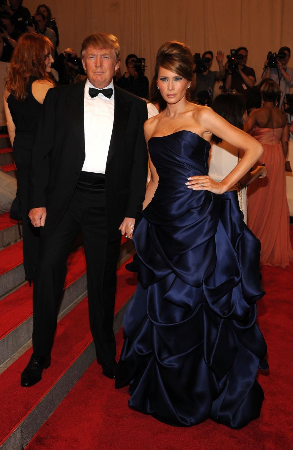 <p>At the 2010 Met Ball, Melania stunned onlookers in a custom Christian Siriano gown designed in a gorgeous navy shade. <i>[Photo: Getty]</i> </p>