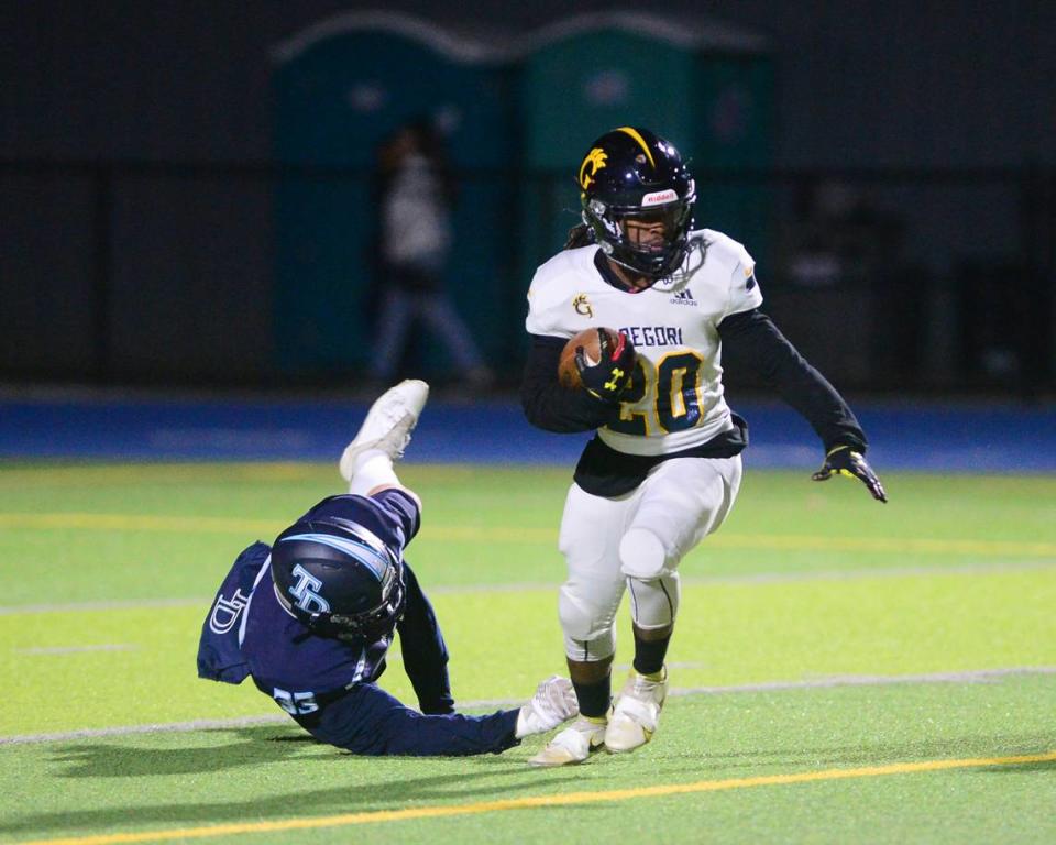 Gregori running back Deandre White Jr. (20) returns a kick during a game between Downey and Gregori at Downey High School in Modesto, California on October 27, 2023.