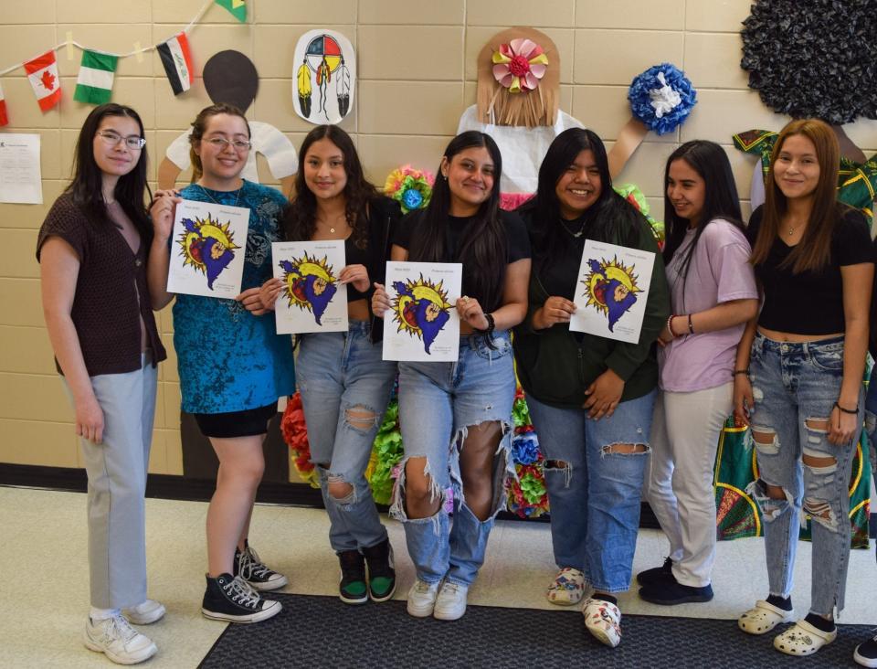 The student writers, designers and editors of "El Corazón de los Latinos" pose for a photo in the English Language Learner wing at Lincoln High School on May 8, 2023.