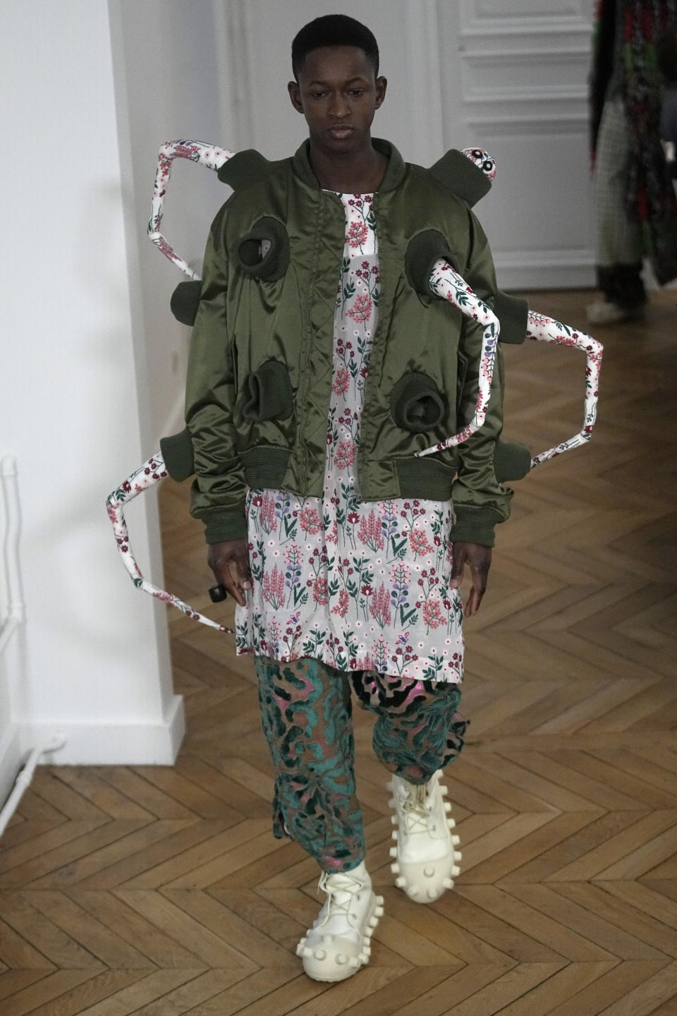 A model wears a creation for Walter van Beirendonck's Menswear ready-to-wear Fall-Winter 2024-2025 collection presented in Paris Wednesday, Jan. 17, 2024 in Paris. (AP Photo/Michel Euler)