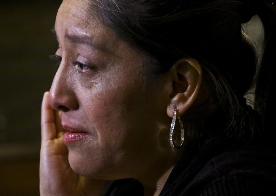 Victorina Morales becomes tearful during an interview, as she recalls "humiliating" treatment at the hands of a supervisor while working at President Donald Trump's golf resort in Bedminster, N.J., Friday Dec. 7, 2018, in New York. Morales say she used false legal documents to get hired and supervisors knew it. (AP Photo/Bebeto Matthews)