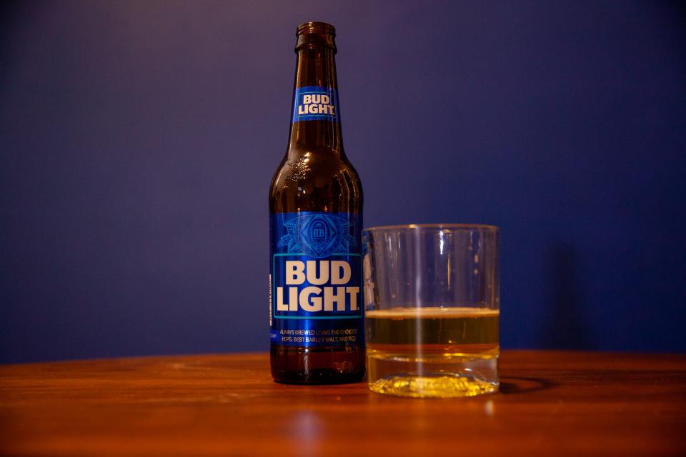 Bud Light beer in glass and bottle